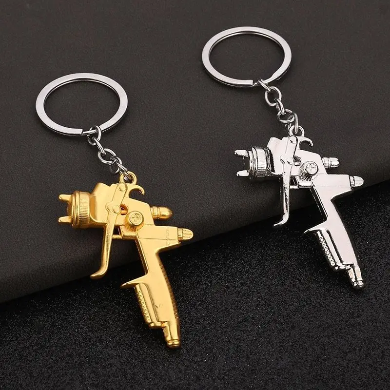 

Creative water gun peripheral key chain mini pendant alloy model gift holiday gift to friends