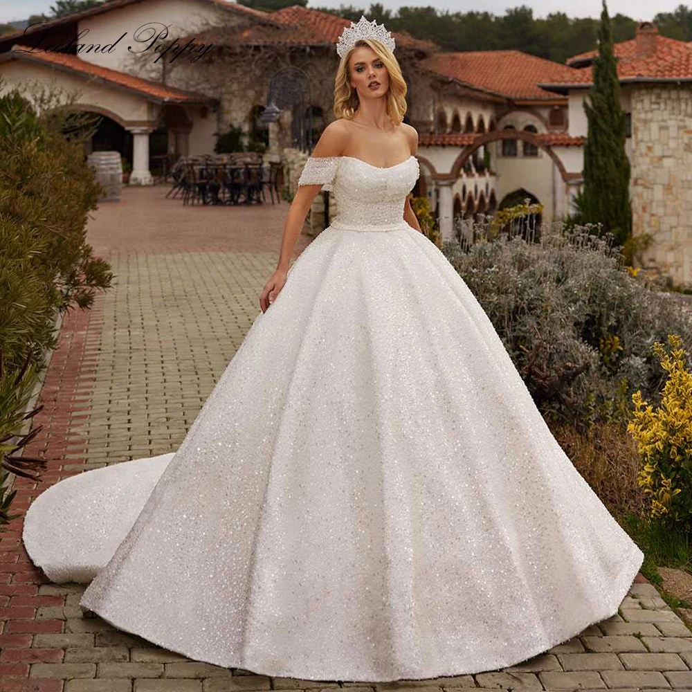 Lceland Poppy Customized Boat Neck Ball Gown Wedding Dresses Sequined Beaded Lace Bridal Gowns with Chapel Train
