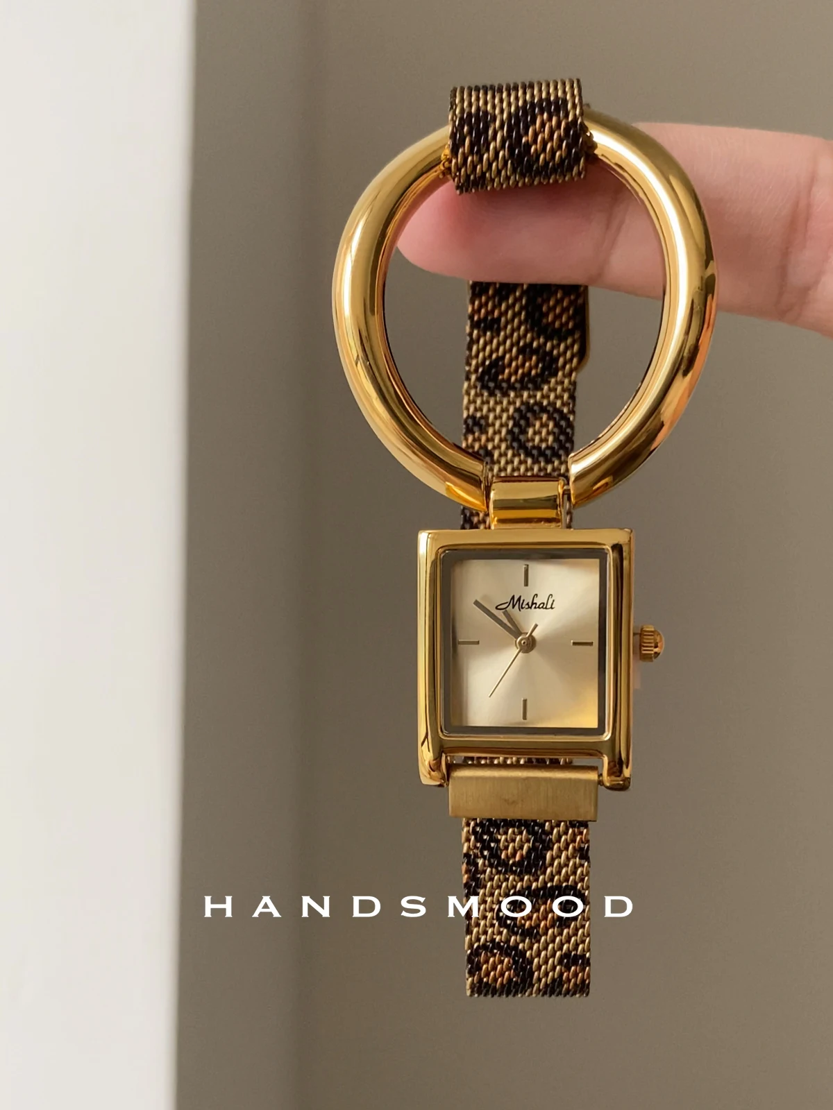 Elegant women's wristwatch with a stylish square dial and leopard print magnetic strap. A perfect gift for your girlfriend.