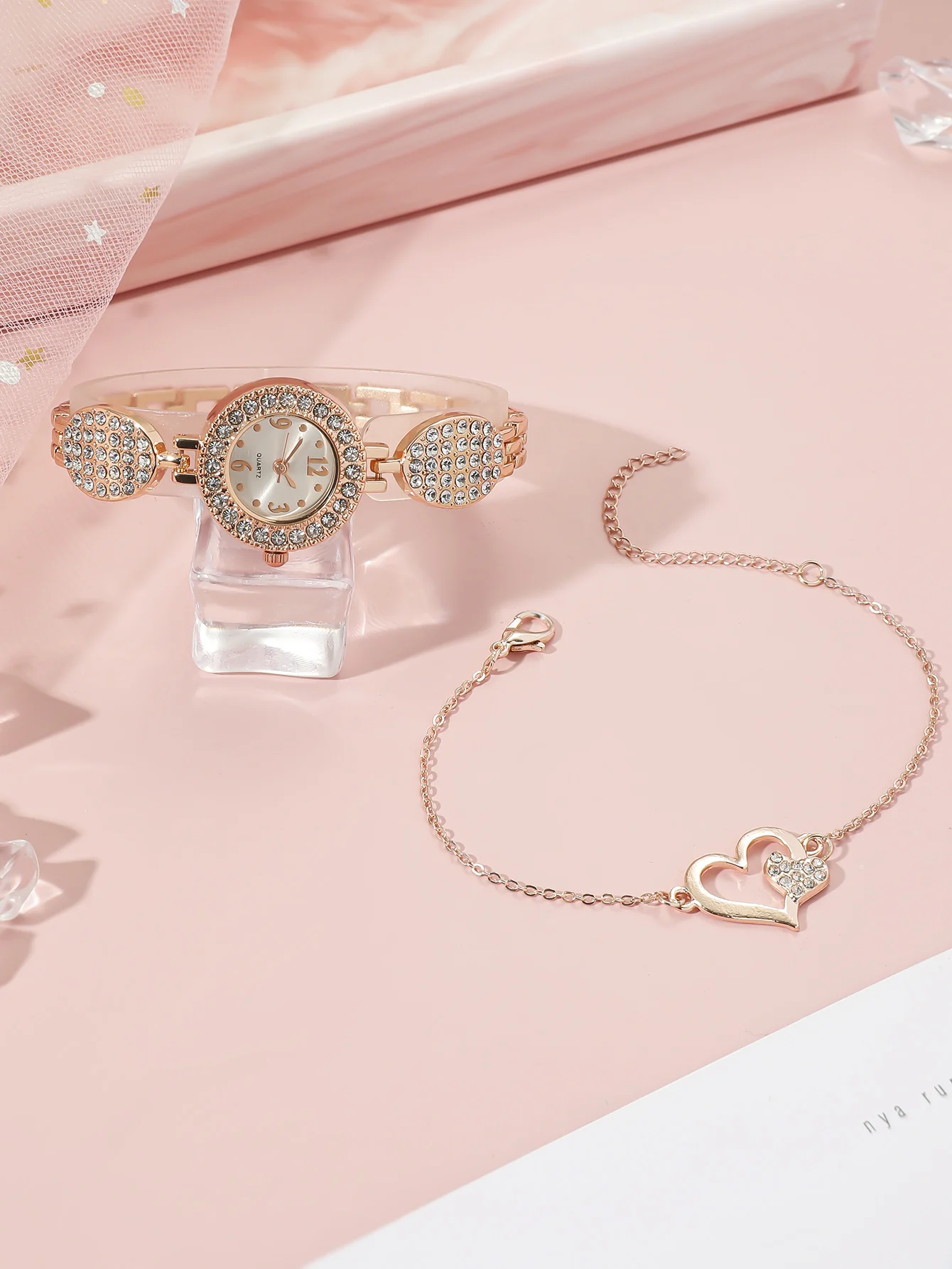 A Rose Gold Stylish Woman With Rhinestone Quartz Bracelet Watch And A Love Bracelet Accessory. Can Be used In Daily Life