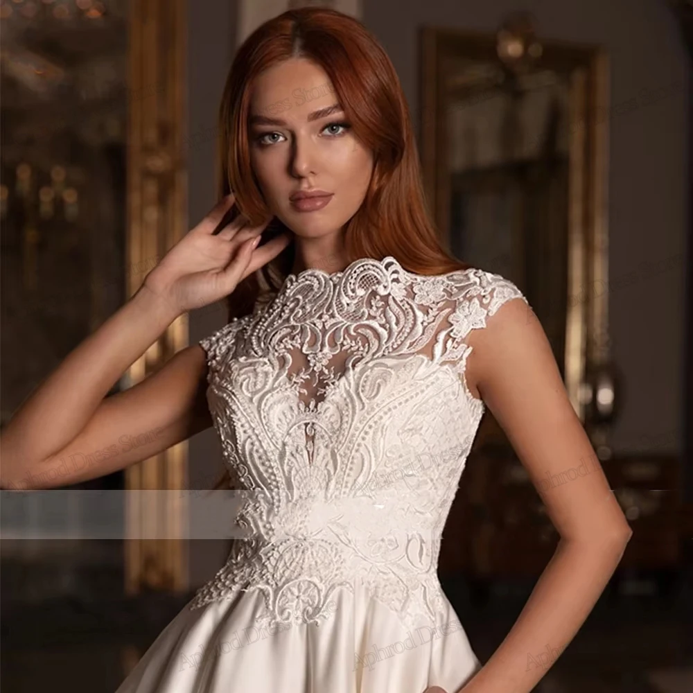 Robes De mariée glamour une ligne Robes De mariée en Satin dentelle Appliques sans manches Robes gracieuses robes De Novia personnalisées 2026