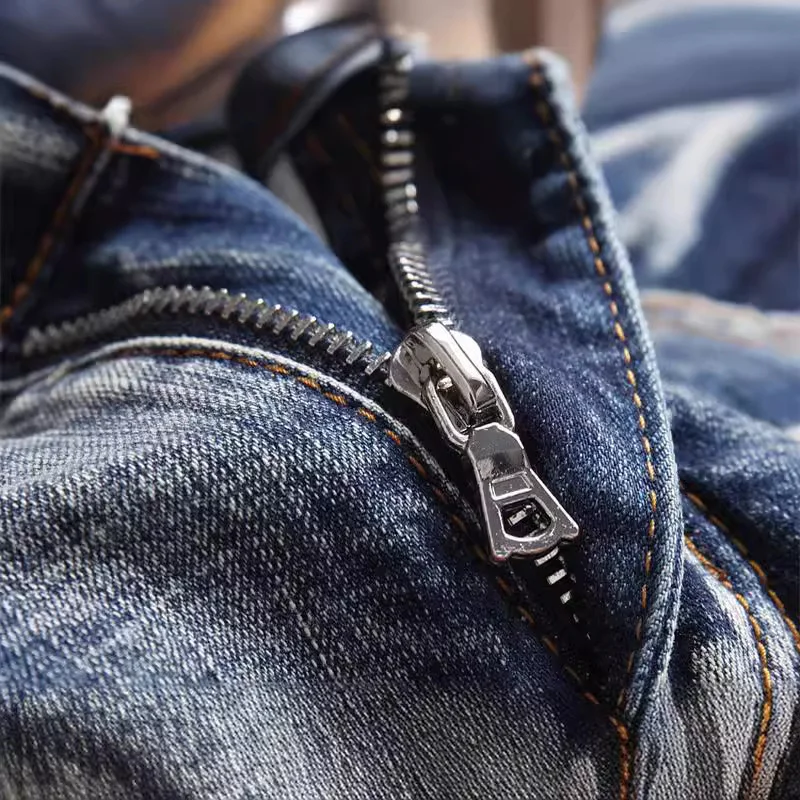Jean pour hommes avec patchs déchirés, pantalon tendance extensible, coupe slim et polyvalent pour hommes