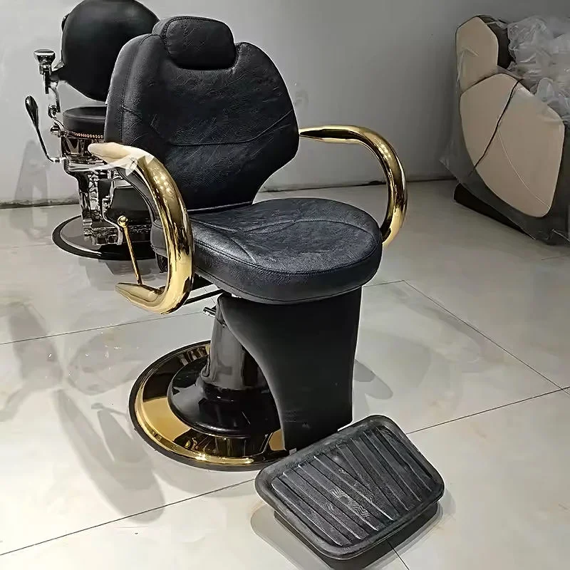 

Vintage Black Leather Barber Chair with Gold Armrests and Footrest
