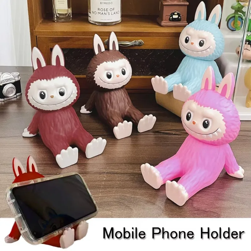 The Monster Labubu Phone Holder Cartoon Cute Anime Smiling Doll Figure Model Desktop Holder Accessories Home Decor Kids Gifts