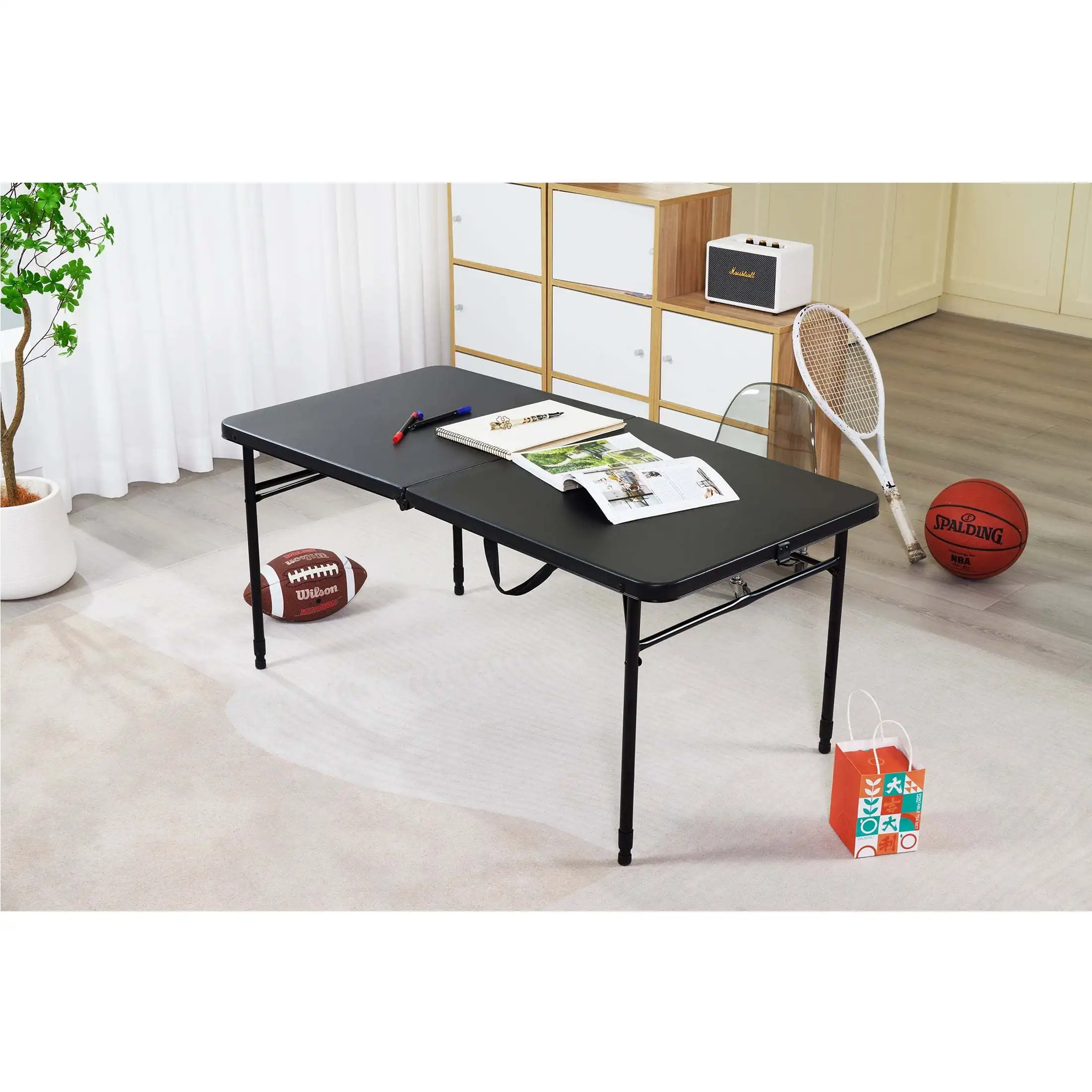This 4-foot adjustable folding table can be easily folded in half for easy storage. Classic black design, simple and beautiful