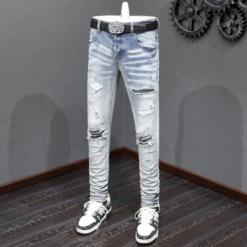 Fashionable new denim jeans washed nostalgic distressed black leather patch elastic slim fit light blue jeans high street hip-ho