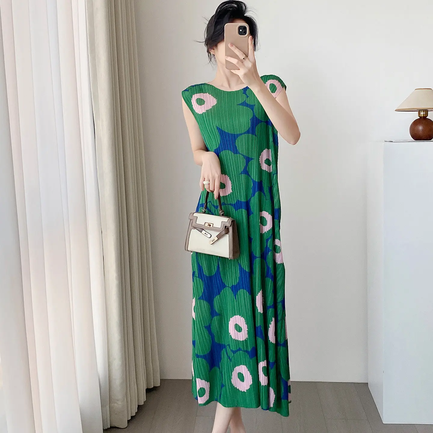 

Miyake Pleated 2026 Spring and Summer New Printed Dresses Women Sleeveless Pleated Green Long Thin Large Swing Beach Dresses