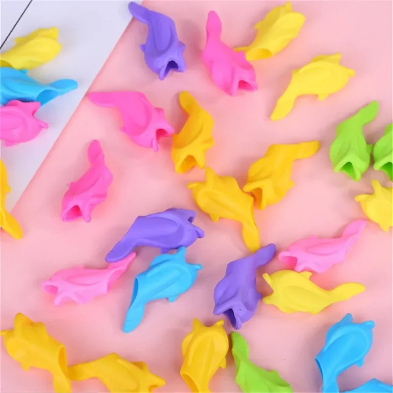 100PCS Small Fish Dolphin Holding Pen Silicone Pencil Neutral Pen Holding Orthosis Corrector Writing Posture Pen Holder