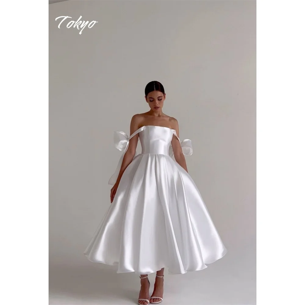 Vestidos de novia acampanados blancos personalizados de Tokio, vestidos de novia elegantes sin mangas con hombros descubiertos, vestidos de novia hasta Tra 2025