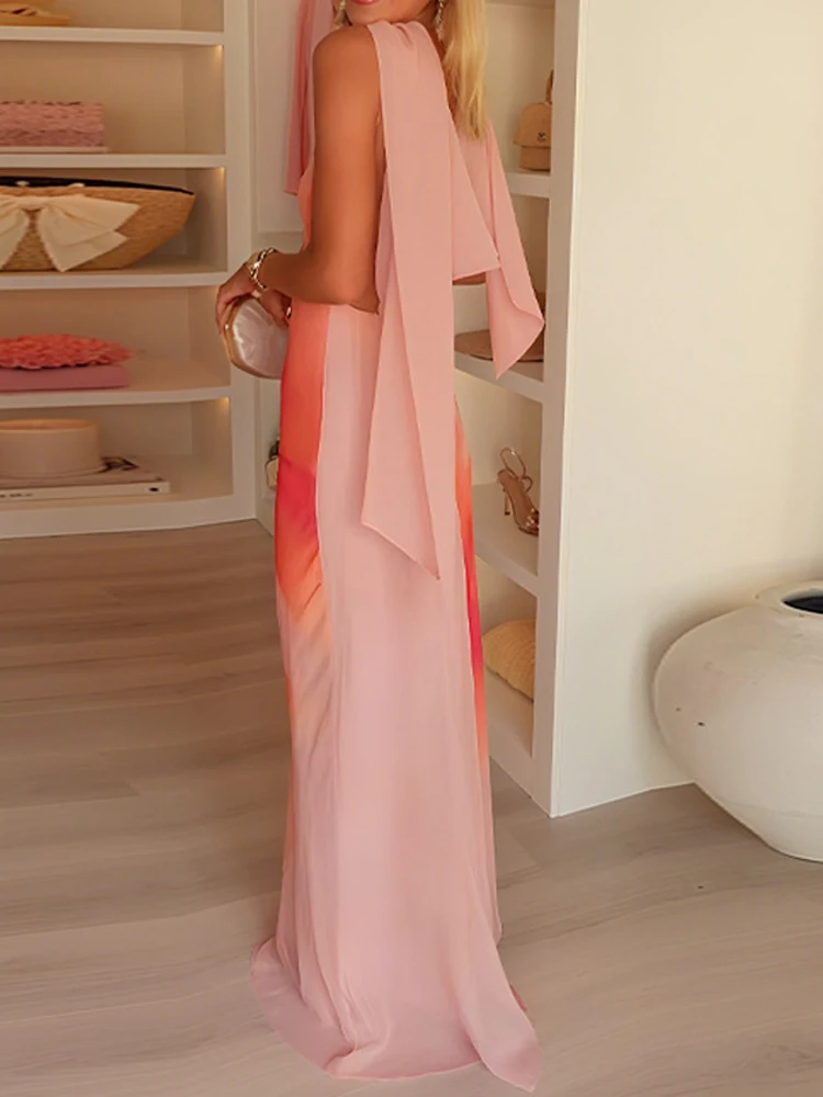 セクシーなVネックノースリーブホローアウトレディースドレスカジュアルボヘミアンビーチロングドレス2026春夏花柄プリントサスペンダードレス