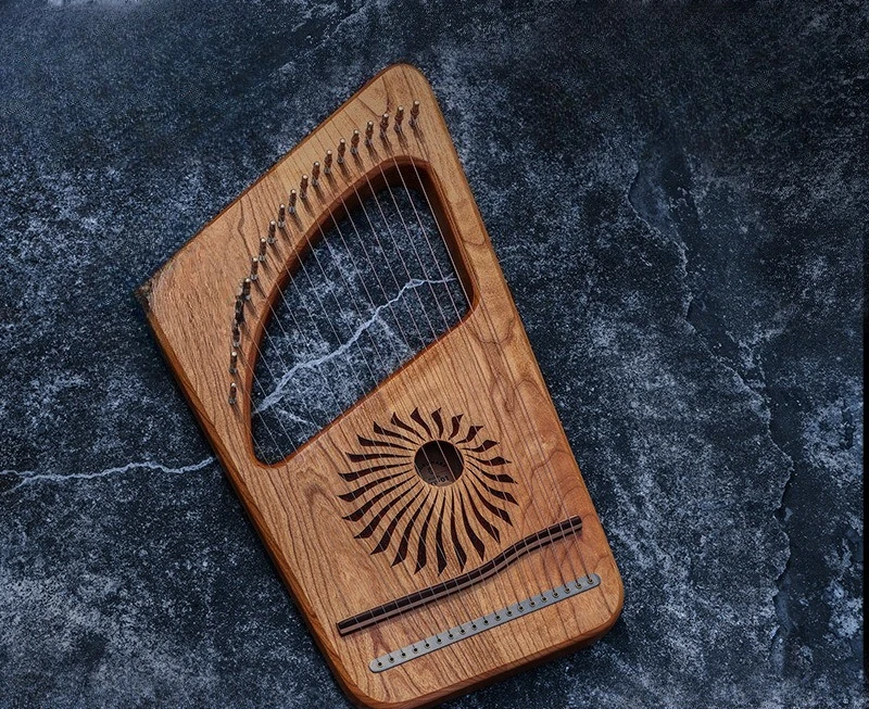 The 19-tone Leiya lyre, 19-string Lil, and small harp instrument