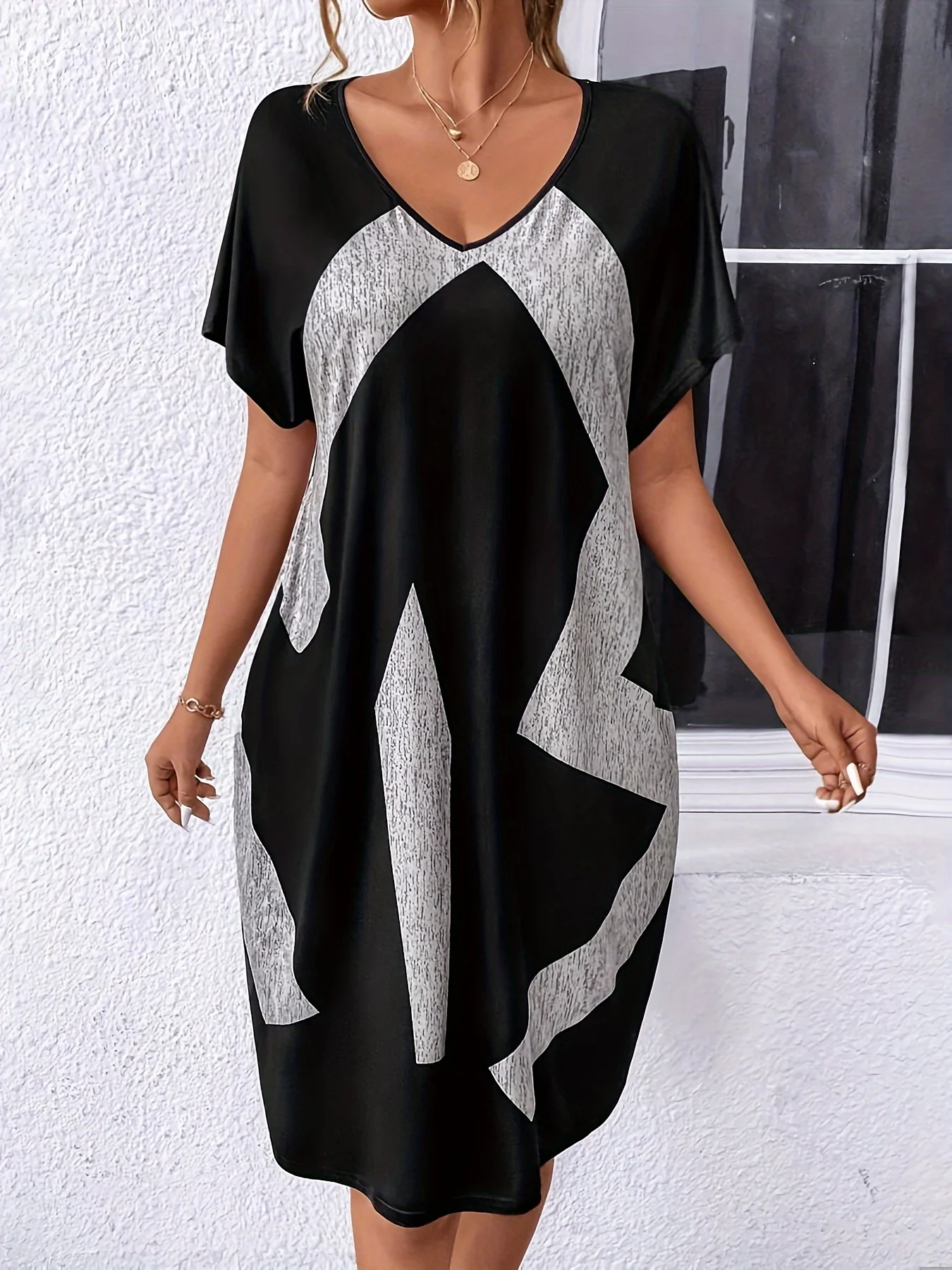 فستان تي شيرت عصري وكاجوال فضفاض بأكمام خفاش وجيب غير مرئي #4