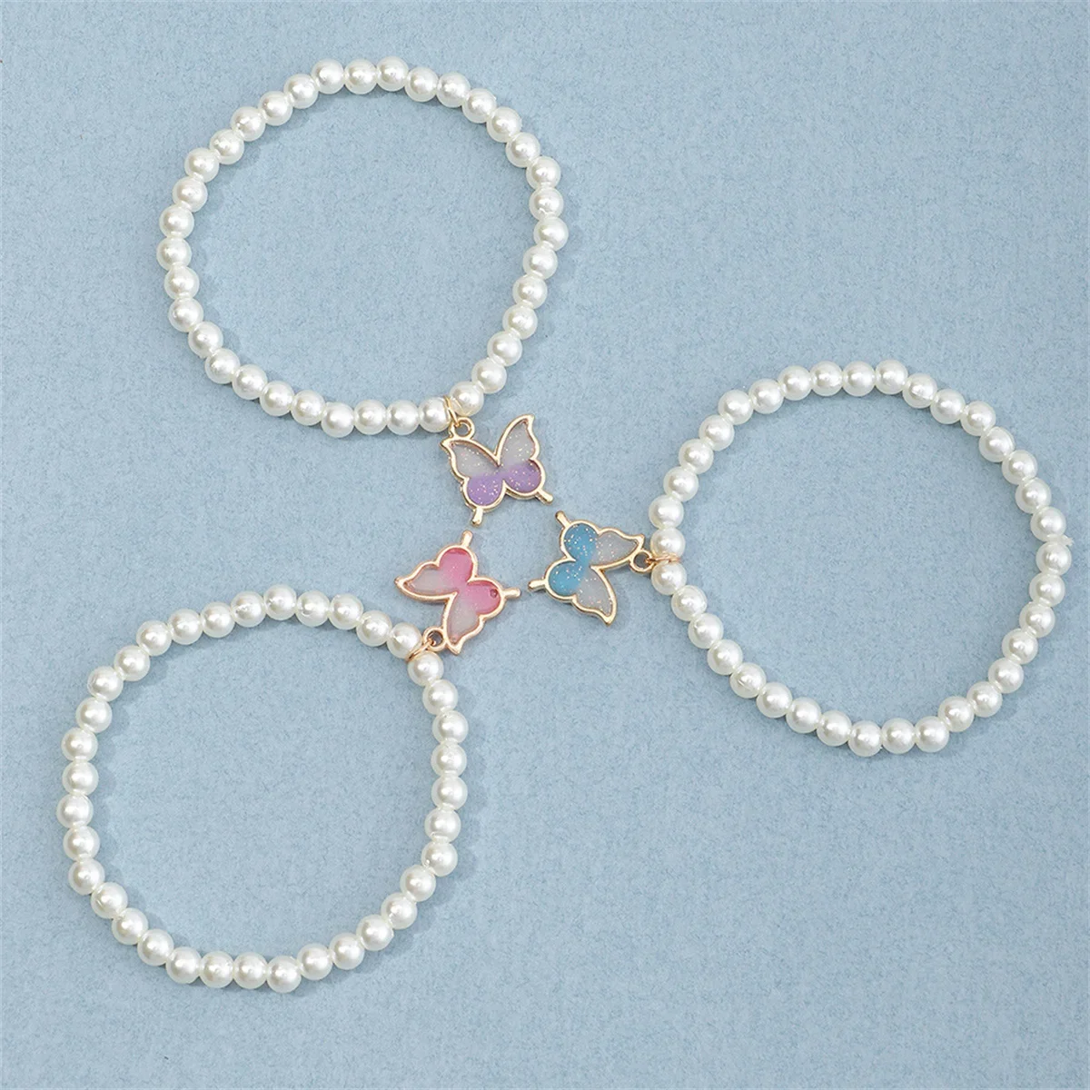 مجموعة أساور من اللؤلؤ المقلد للفتيات مكونة من 3 قطع مع تصميم فراشة بسيط وإكسسوارات مجوهرات أنيقة وأنيقة للأطفال #3