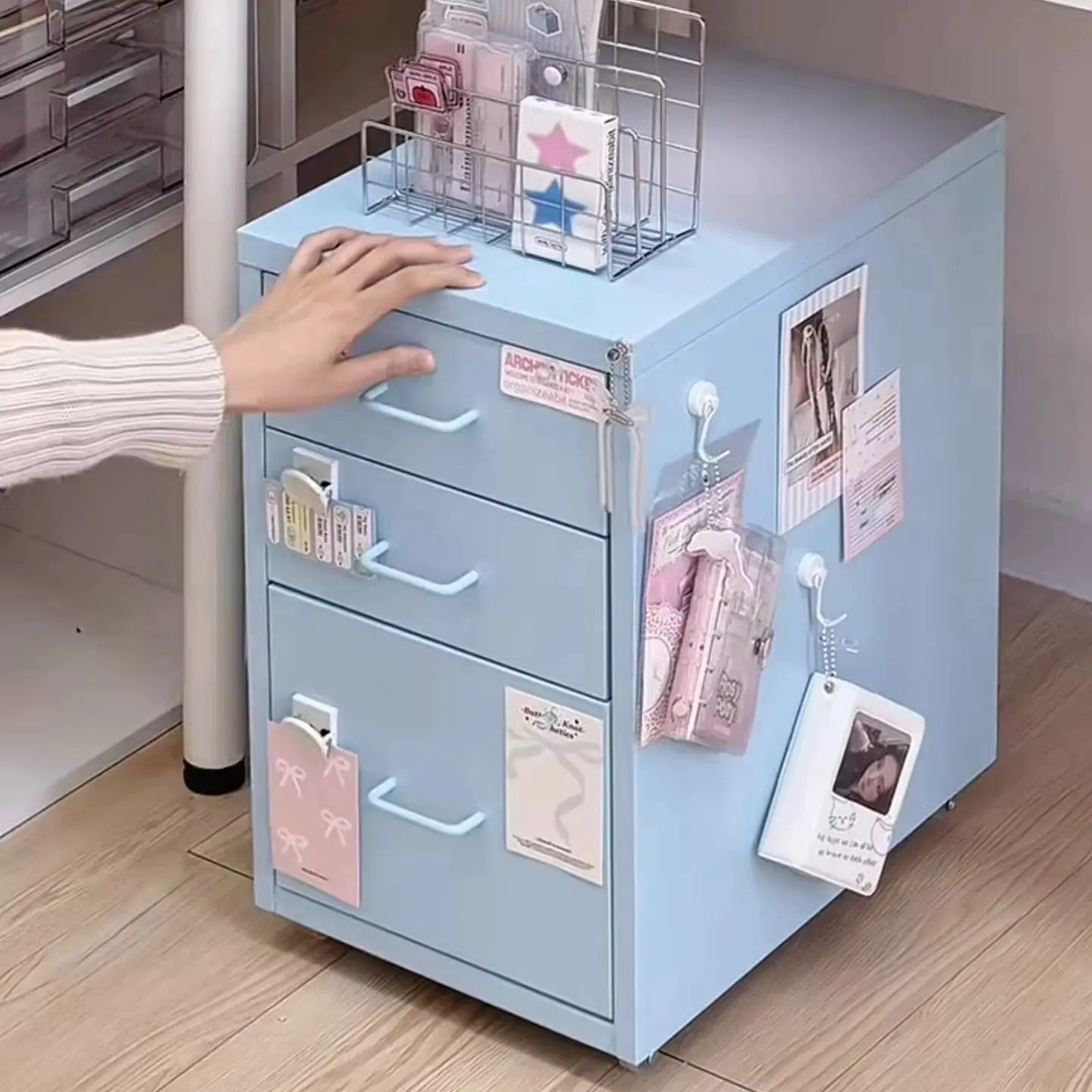 Macaron blue ins wind three pumping storage cabinet metal belt wheel design, bedroom cream wind file sorting locker