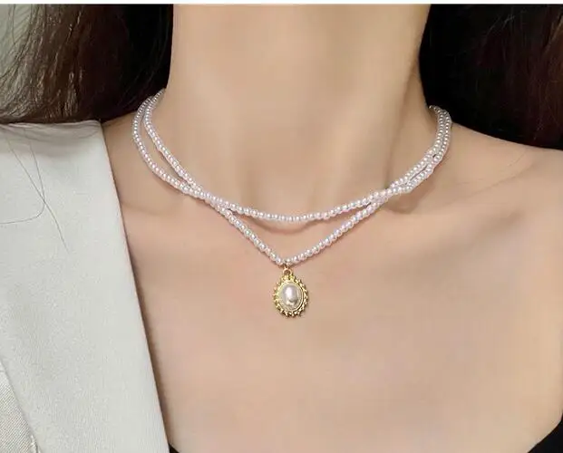 

European fashion elegant retro double layer pearl necklace women's ins net red clavicle chain simple minority design neck jewelr