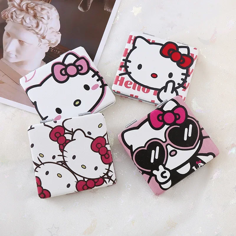 Espejo plegable portátil de Hello Kitty Sanrio, espejo pequeño Kawaii, patrón de doble cara, regalo de maquillaje para niñas