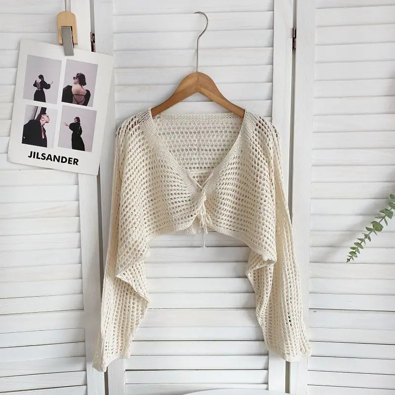 Spring and summer new sweater cardingans sense niche lace up long sleeved hollow short knitted sunscreen cardigan top women