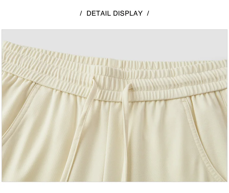Damenhosen: Lässige, geschlitzte, lockere, geschwungene Slim-Fit-Hose im minimalistischen, vielseitigen Stil mit geschwungenem Bein – Sommermode 2026 für den Alltag – Detail 13