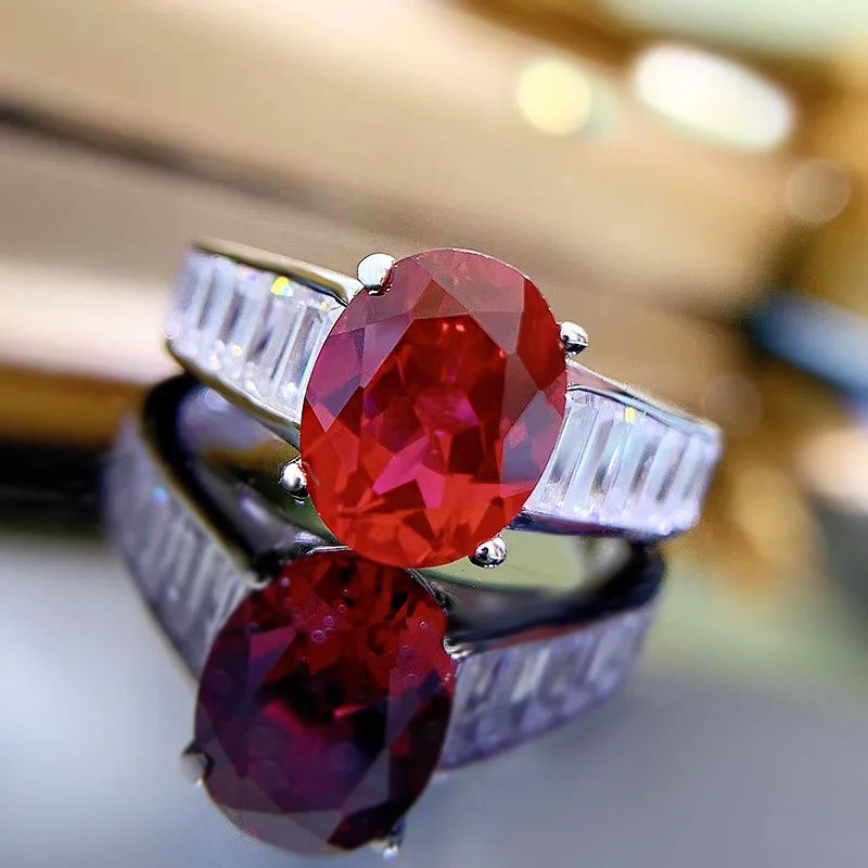 El nuevo anillo de rubíes ovalados de color rojo palo de pavo, de 7 x 9, de la colección Xiaoyan, está hecho 100 % de plata de ley S925. Es una joya exquisita para mujer, ideal como regalo conmemorativo para un aniversario.