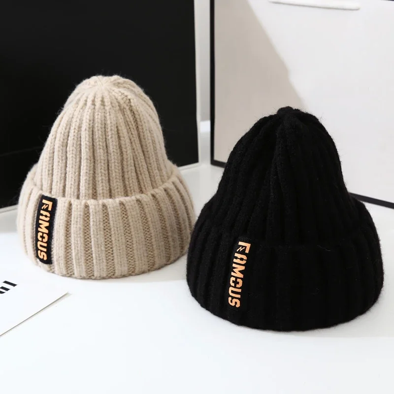 Versatile Knitted Winter Hat for Ladies, Soft Warm Ear Protection Beanie With Long Label Design Windproof Daily Streetwear Cap