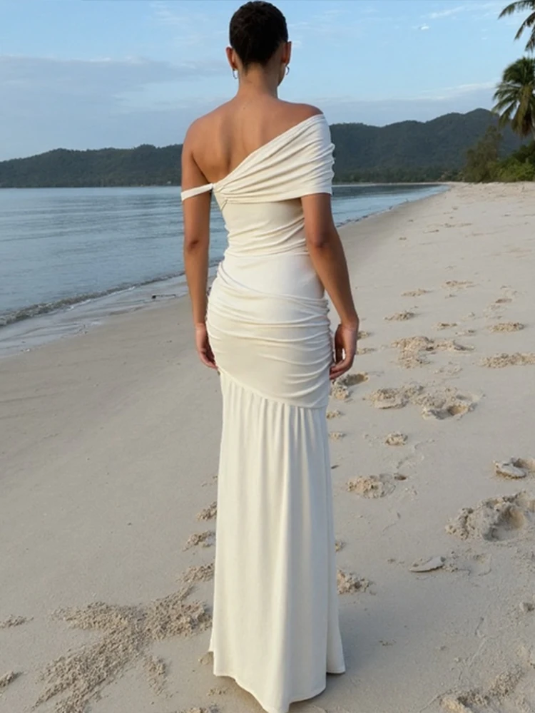 Kliou 非対称エレガントな 2 点セット女性固体シンプルな傾斜ショルダースリム Tシャツ + プリーツマキシスカート女性のハイストリートスーツ