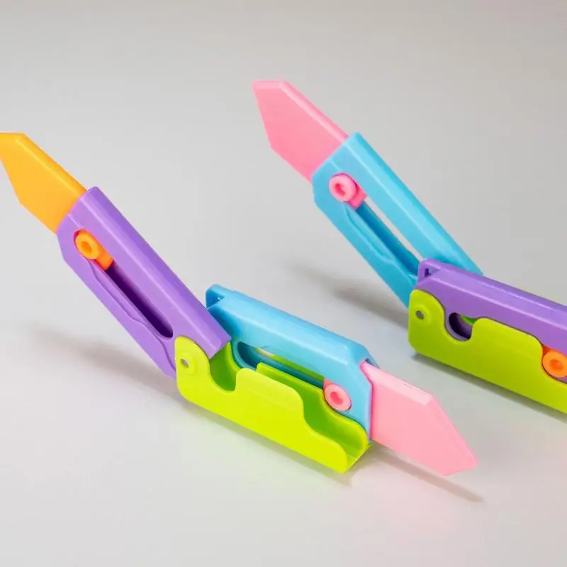 Cuchillos de juguete retráctiles 2 en 1 con estampado 3D para niños, juguete sensorial para aliviar el estrés, pinzas de mano, antebrazo