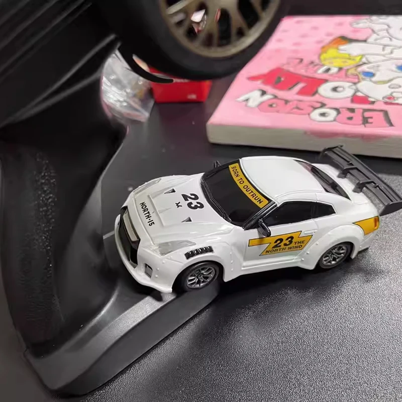 

New 1:43 RC Full Proportion Drift Car High Speed GTR Remote Control Toy Vehicle with Gyro Steering Throttle Four-Wheel Drive