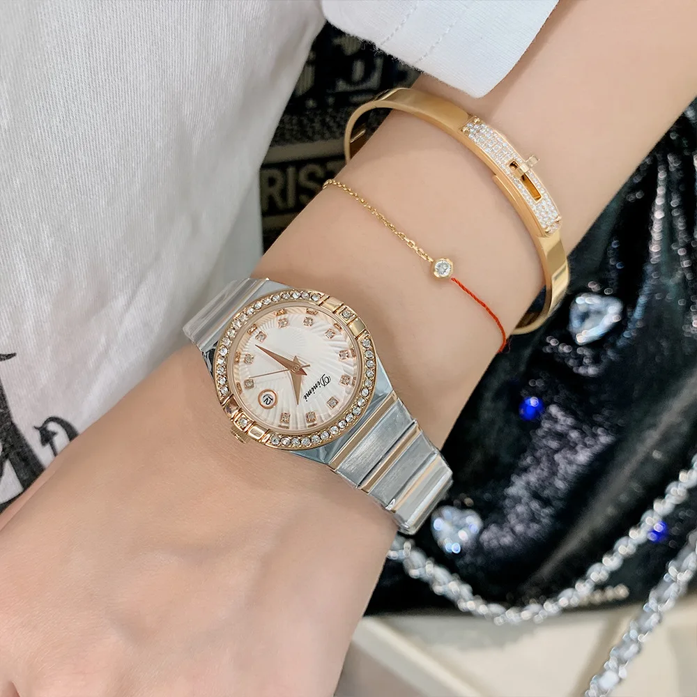 ساعة يد نسائية جديدة أنيقة بمينا دائري وتقويم كاجوال وحزام من الفولاذ المقاوم للصدأ وساعة كوارتز وإكسسوارات اختيار راقي