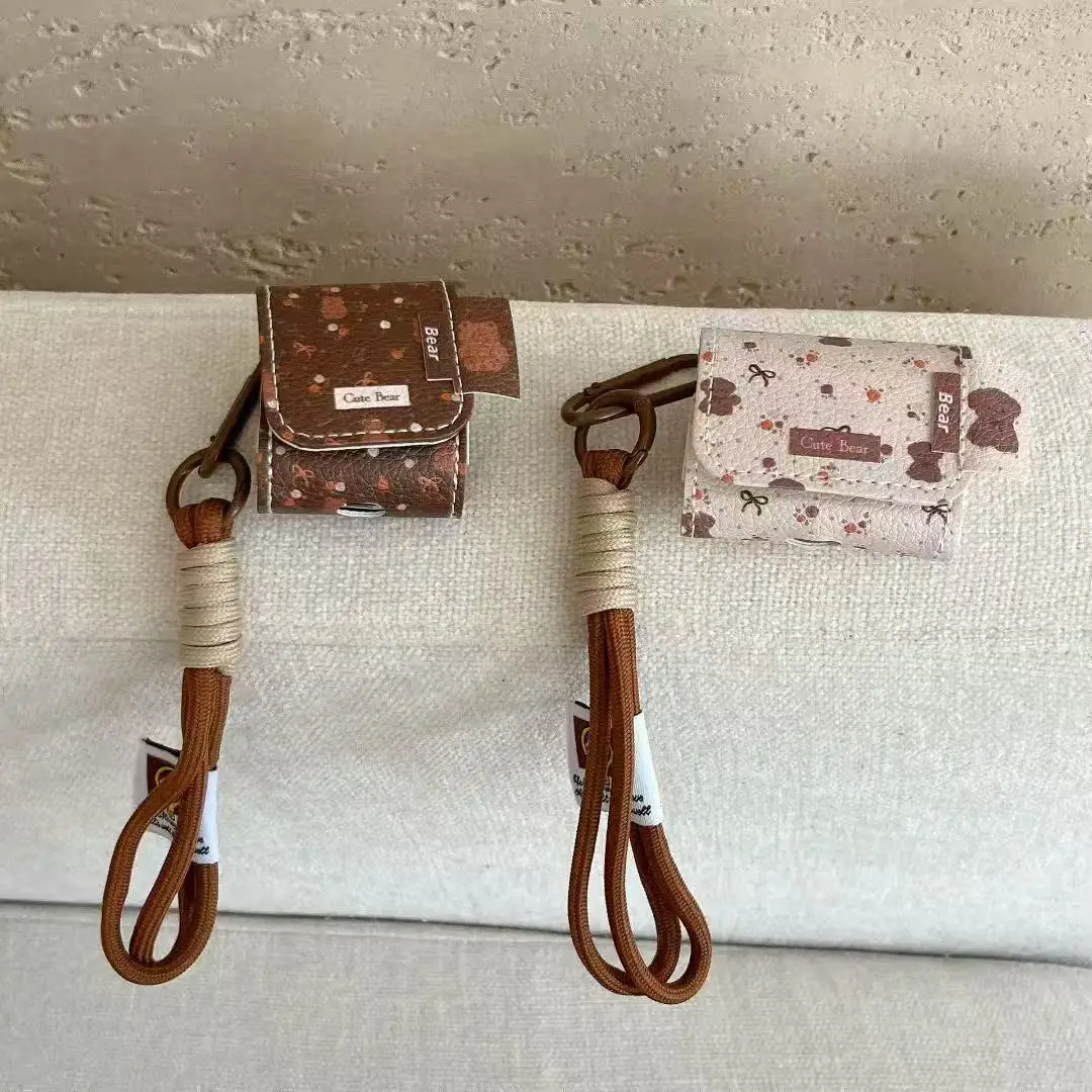 高級感のある小さなクマ柄レザーイヤホンケース AirPods Pro 2/3用 耐衝撃カバー ランヤード付きヘッドセットバッグ AirPods 4/3/2/1世代対応