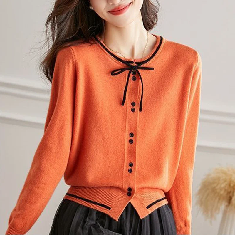 Nuova primavera autunno stile francese elegante Chic Lace Up Bow Kawaii dolce manica lunga Cardigan lavorato a maglia donna Casual Slim maglione Top