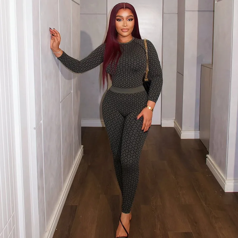 จั๊มสูทผู้หญิงซิสเตอร์สตาร์แฟชั่นสลิมฟิตยืดพิมพ์ลายคอกลมแขนยาวชุดจั๊มสูทลำลองสำหรับเดินทางที่ดูสง่างาม