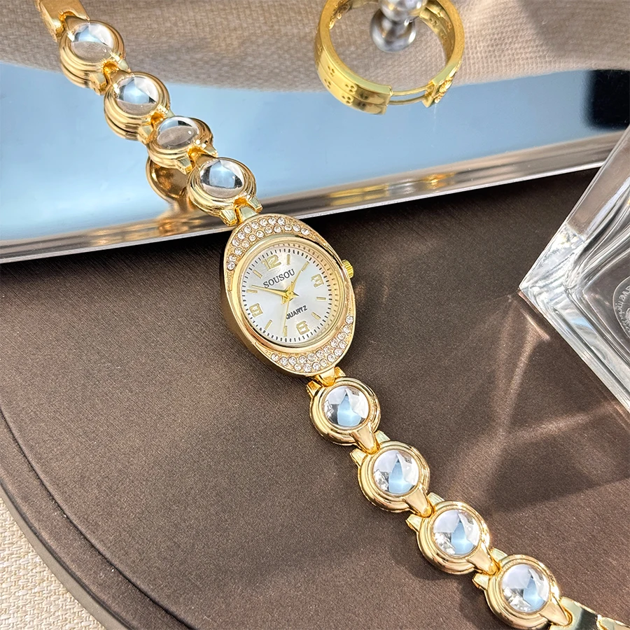 A new oval diamond-encrusted case with a shiny and colorful large bead bracelet unique and beautiful quartz watch for women