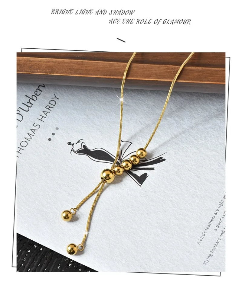 

A long and personalized pull-out steel ball tassel necklace, a titanium steel necklace suitable for women