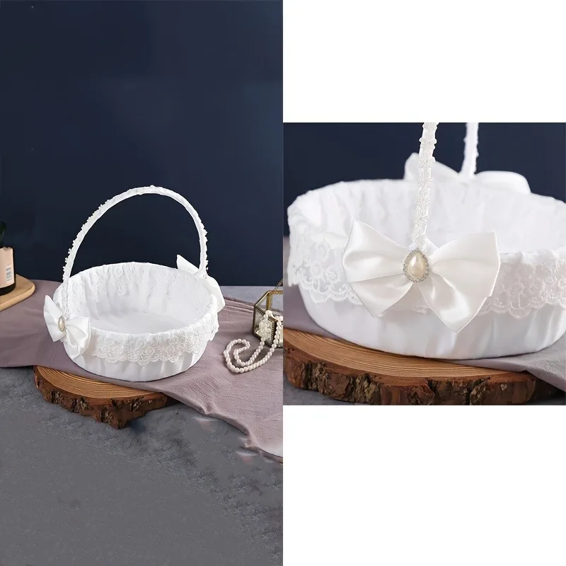 A floral basket with wedding candies, scattering flowers, and a beautiful large bow for the white flower girl.