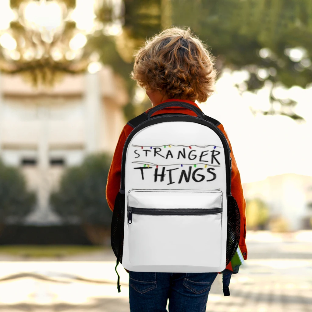 Mochila con logotipo de Stranger-th.ings para niños, morral escolar de alta capacidad, resistente al agua, a la moda, para ordenador portátil de 17 pulgadas ﻿ ﻿