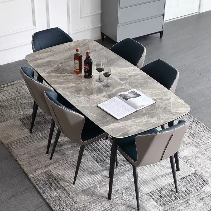 

Italian rock slab dining table and chair combination small apartment home modern simple light luxury rectangular dining table