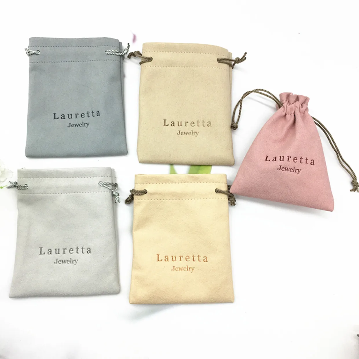 

white bags, personalized custom drawstring bags with logo, jewelry packaging, necklaces, Valentine's Day gifts