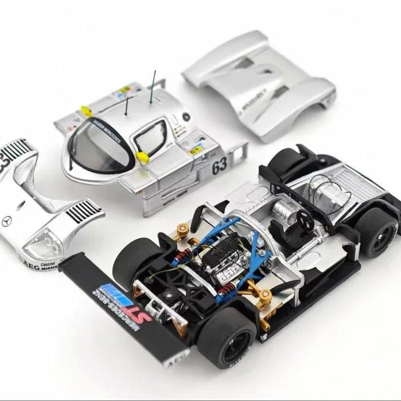 YS 1:64 Sauber C9 Le Mans die-casting simulation static open cover alloy car model, boys' festival gift toy collection ornament.