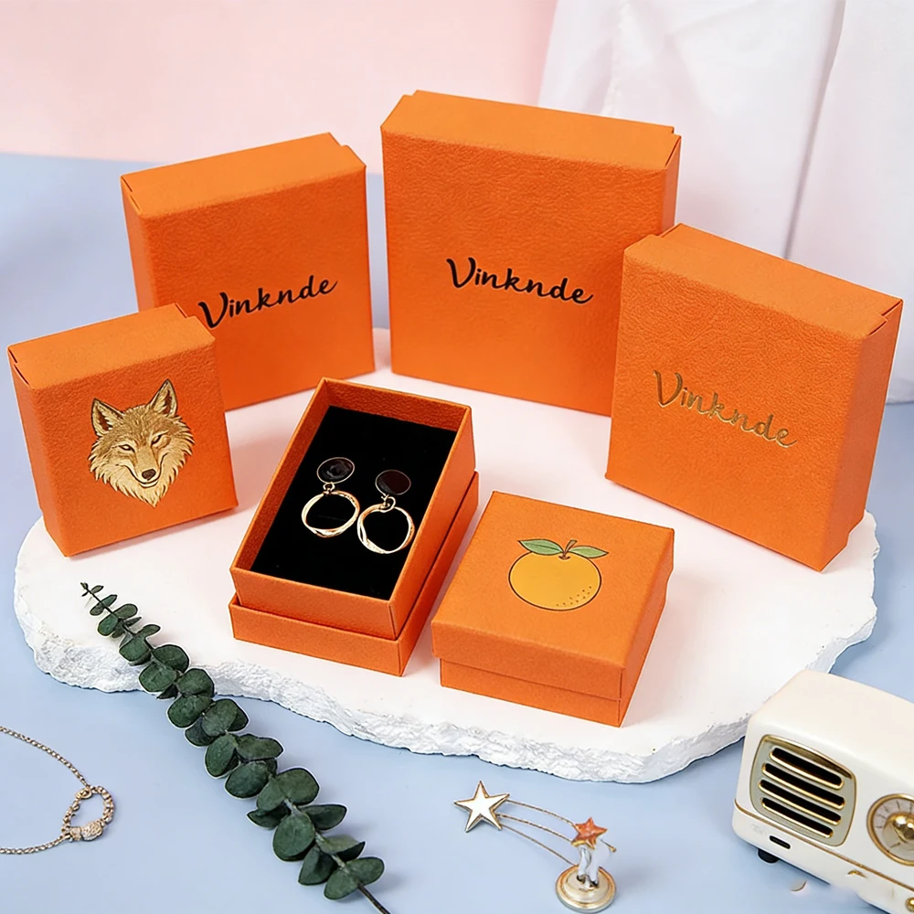 

24/50/100Pcs Orange Textured Jewelry Gift Boxes Multi-Size Storage Case with Black Velvet Lining Custom Logo Earrings Brooch Box