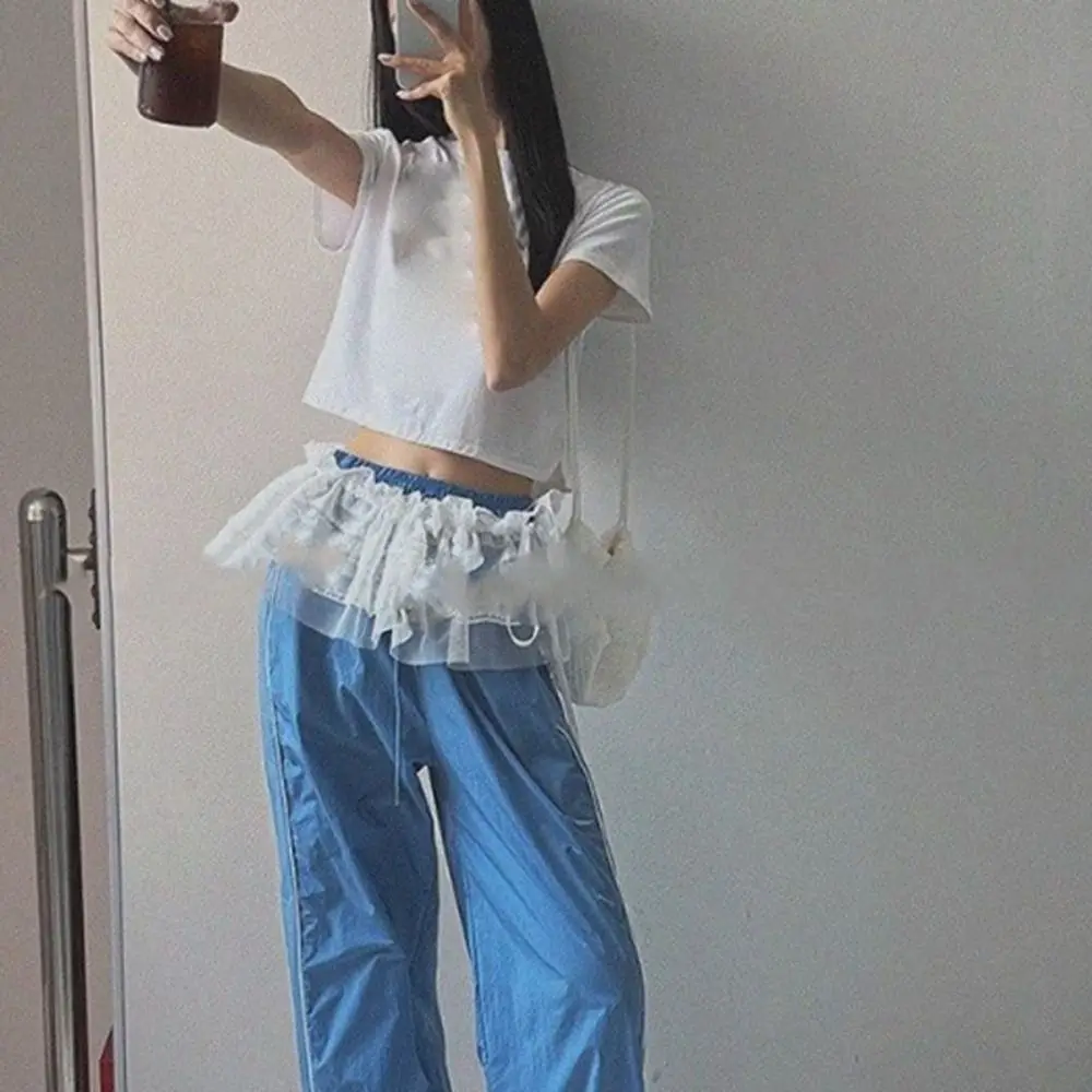 Nueva minifalda de encaje con flores bordadas, ropa de calle Y2K transparente, falda con volantes y cordones, faldas plisadas Harajuku, decoración de pantalones vaqueros