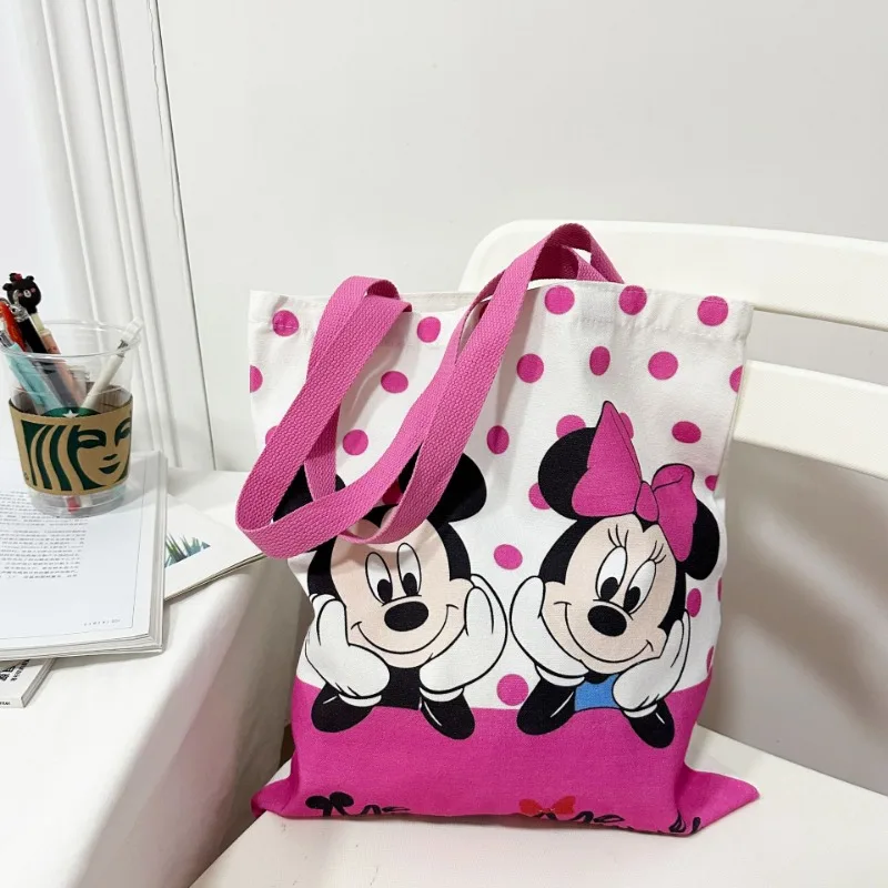 Nuevo bolso de mano con estampado creativo de dibujos animados de Mickey y Minnie de Disney, bolso de lona de gran capacidad a la moda para mujer