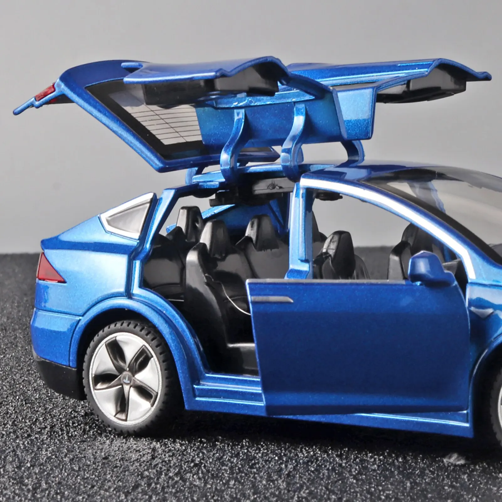 Model X Toy Car, 1:32 giocattoli per auto pressofusi in lega di zinco per bambini, tirare indietro il modello di auto in scala di apertura della