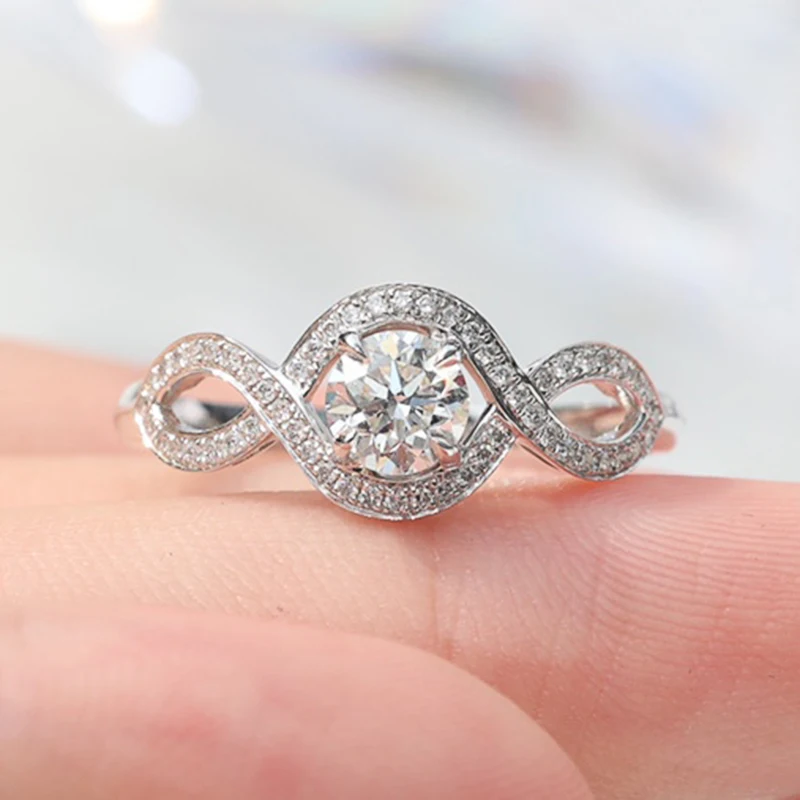 Huitan Fancy Twist Design Ringe für Frauen, voll gepflastert, brillanter Zirkonia, Temperament, elegante Kristallringe, Hochzeitsschmuck