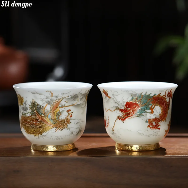 

Sheep Fat Jade Porcelain Tea Set High End Personal Master Cups Dragon and Phoenix Pairs Counter Mouthed Cups