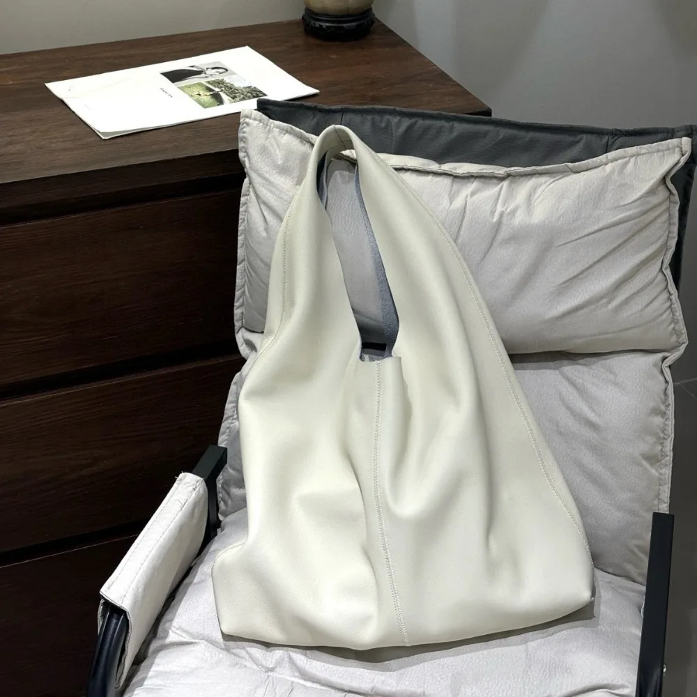 

New Trend Triangle Large Capacity Tote Simple Loose Lazy Style Soft Cowhide Shoulder Unique Premium Simple Fashion Underarm Bag