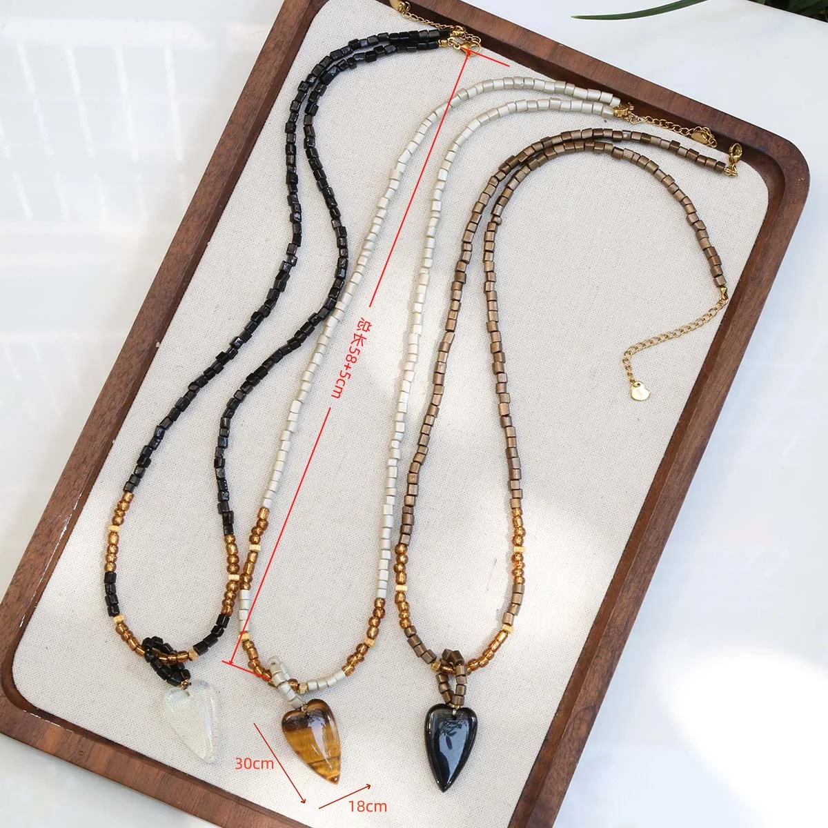 Retro Maillard color heart necklace for women 2025 new unique design sweater chain niche versatile long sweater chain