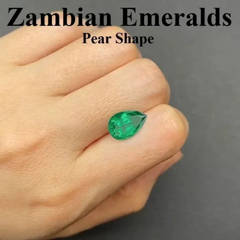 

Top Lab Grown Zambian Emeralds Pear Shape Hydrothermal Hand Cutting Cut With Cracks Inclusions Inside Selectable AGL Certificate