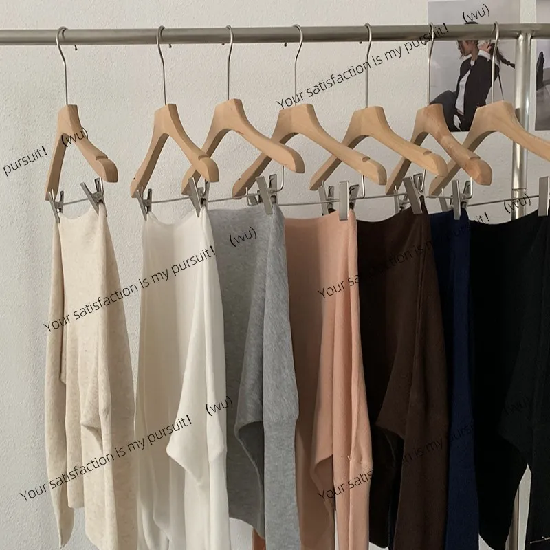 Sweater rajutan tipis dan ramping warna solid dengan lengan kelelawar dan bahu miring, mode awal musim gugur wanita Korea.