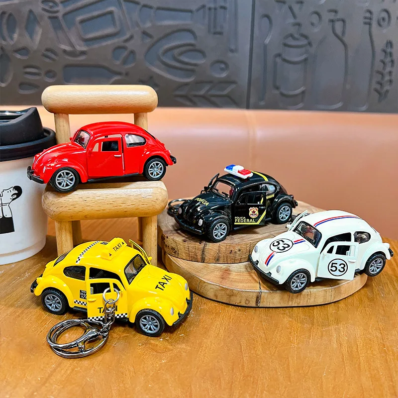 

Креативный новый брелок-машинка из сплава в виде жука с двойными дверями, откатывающийся, забавная игрушка-антистресс, имитация автомобиля, брелок-игрушка, подарок для детей