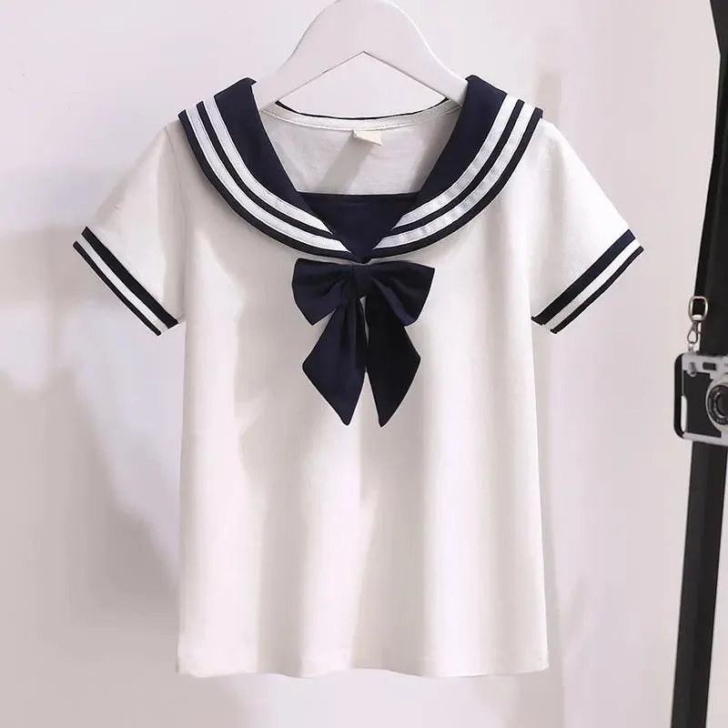 Uniforme JK blanco y negro de verano para niñas, camisa de manga corta + faldas plisadas, uniformes escolares japoneses, falda estilo azul marino, conjunto de dos piezas
